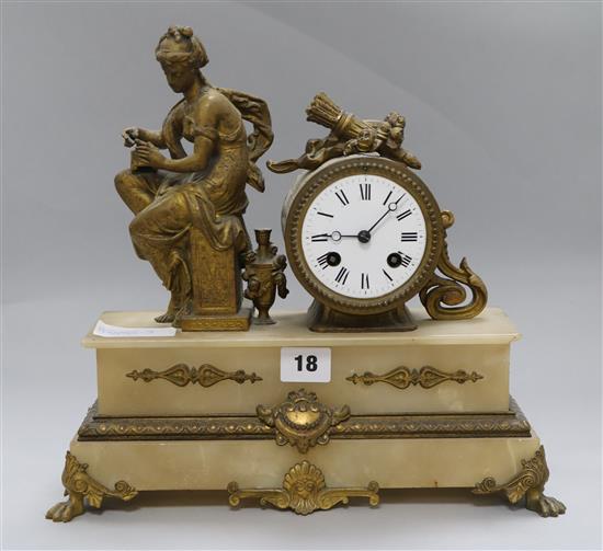 A French gilt metal and alabaster eight day mantel clock